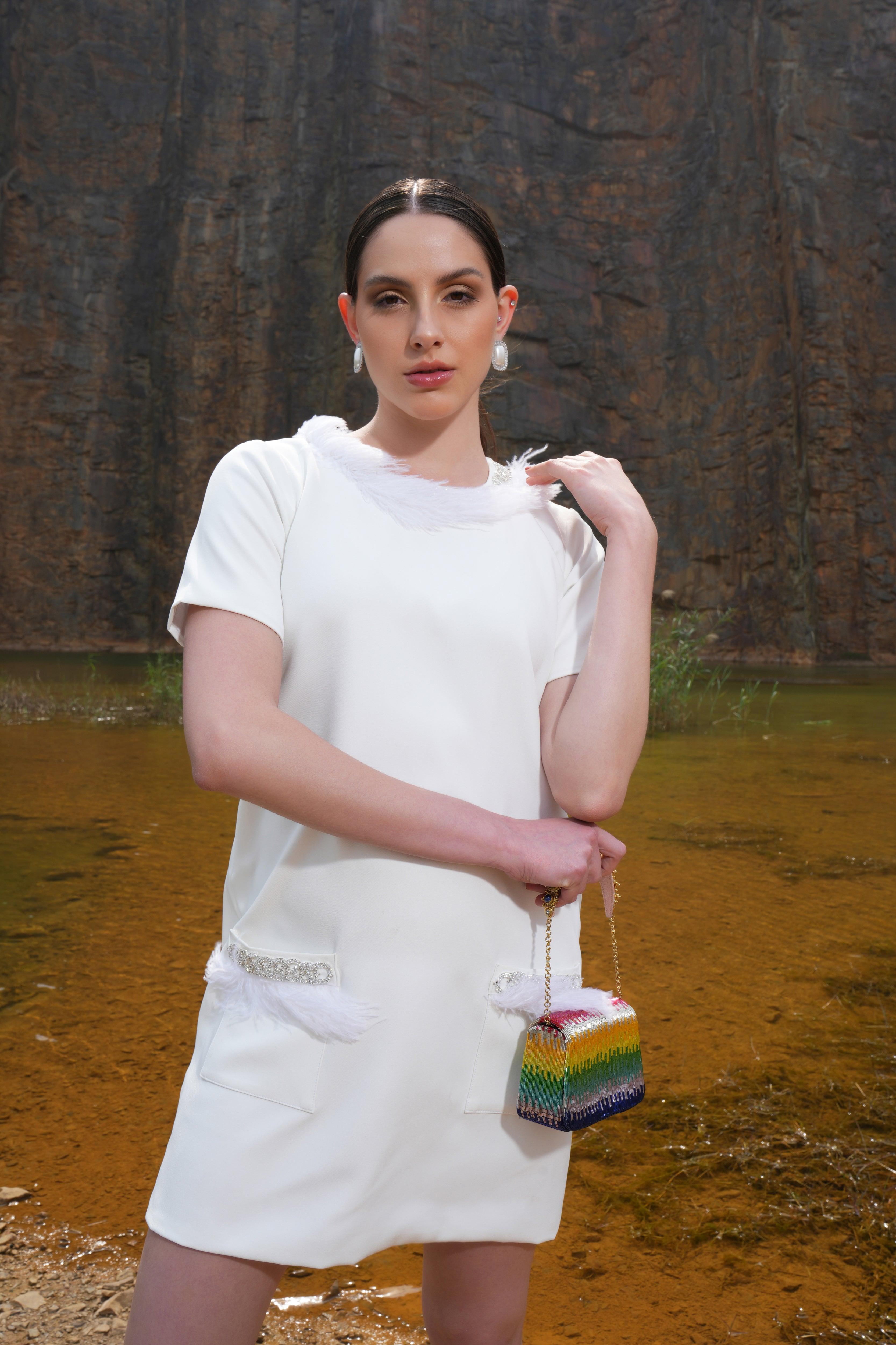 IVORY FEATHER EMBELLISHED POCKET DRESS