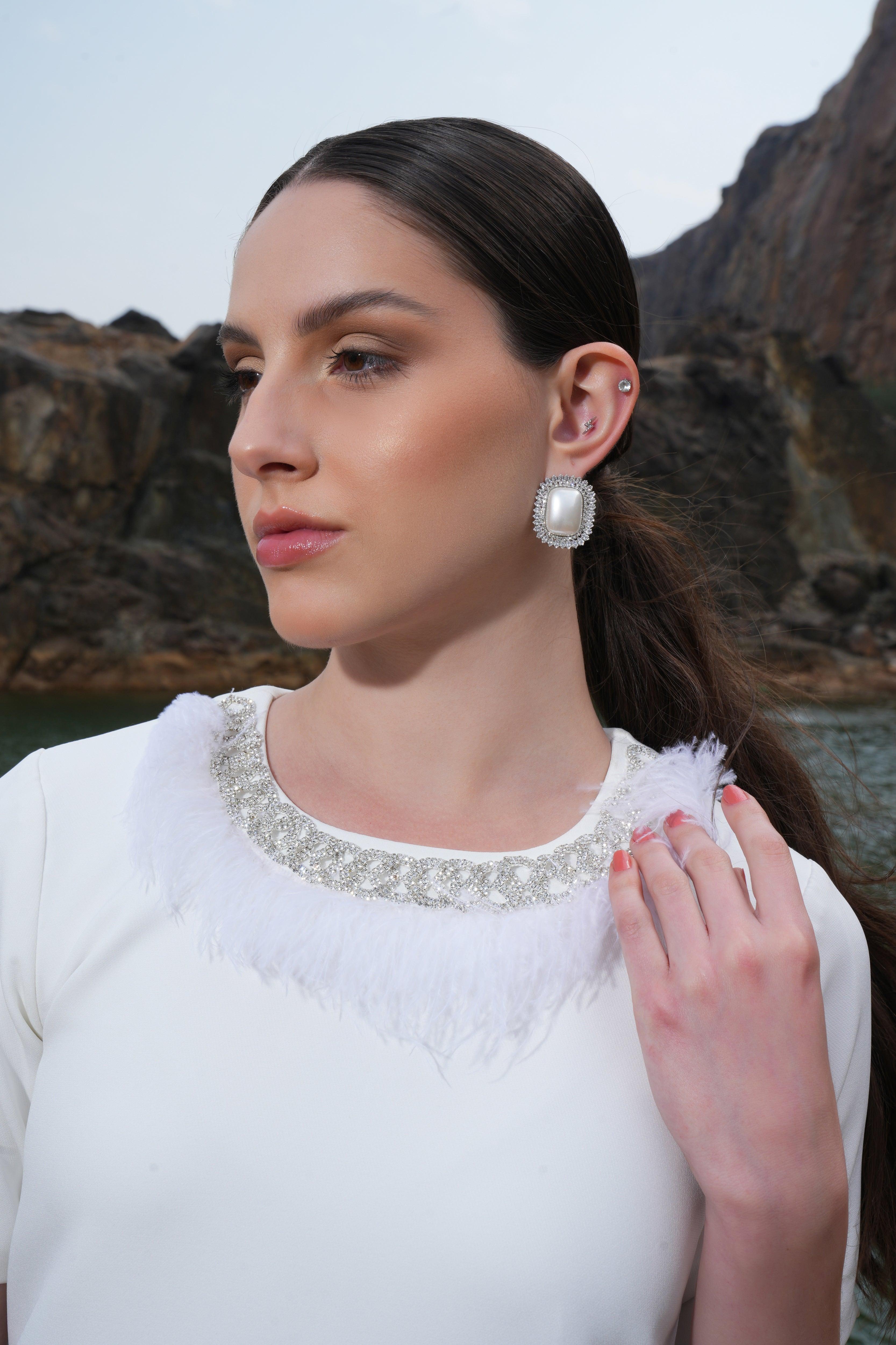 IVORY FEATHER EMBELLISHED POCKET DRESS