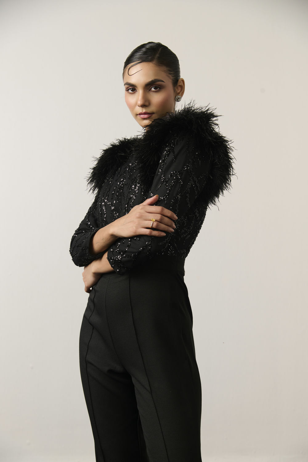 BLACK SEQUIN AND FEATHER JUMPSUIT