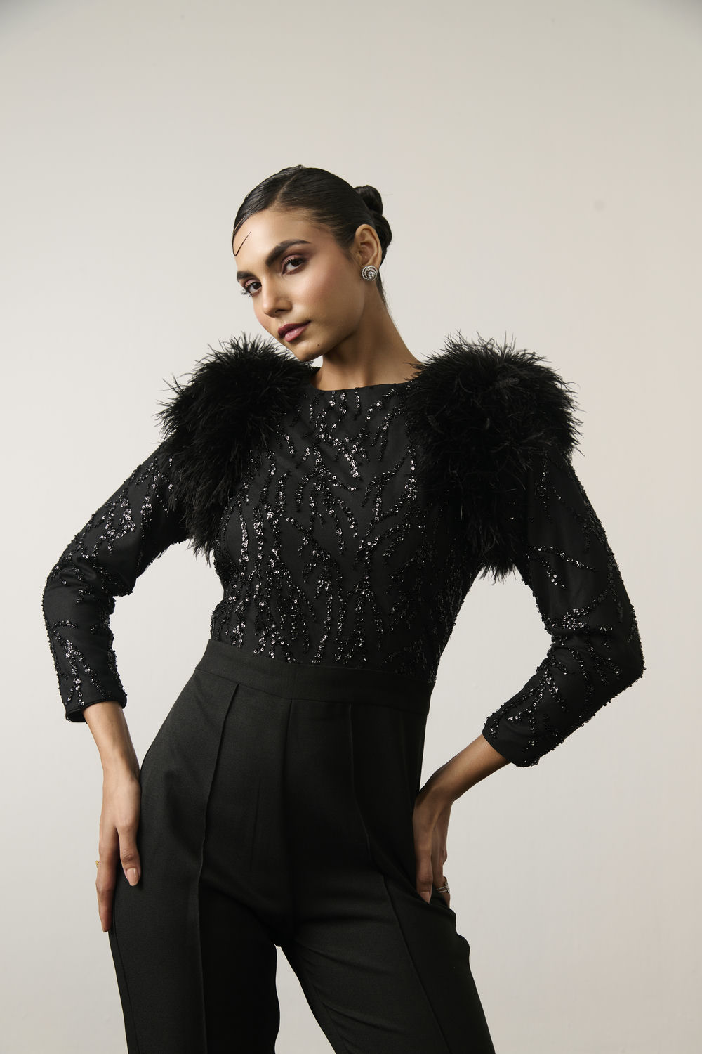 BLACK SEQUIN AND FEATHER JUMPSUIT